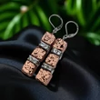 Kép 3/3 - Rose gold kocka lávakő kocka alakú fehér köves rozettákkal bőrbarát
